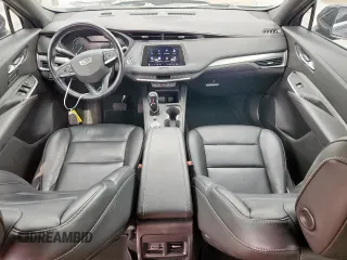 2020 Cadillac XT4 FWD Premium Luxury with VIN 1GYFZCR40LF073517, listed as a Copart auction lot 60121635 with 79,450 mi miles and Salvage title. Bid and sale history available at DreamBid. Image 8.