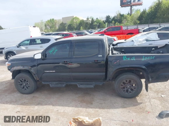 2023 Toyota Tacoma 4WD SR with VIN 3TYCZ5AN4PT170688, listed as a IAAI auction lot 41998053 with 20,770 mi miles. Bid and sale history available at carsss.com. Image 15.