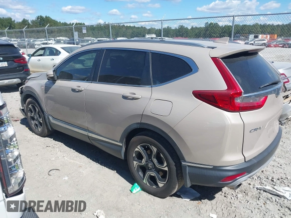 2018 Honda CR-V Touring with VIN 5J6RW1H98JL000031, listed as a IAAI auction lot 40605651 with 129,516 mi miles and . Bid and sale history available at DreamBid. Image 13.