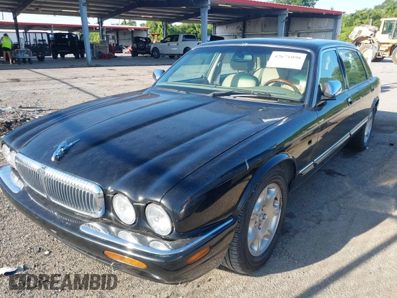 2001 Jaguar XJ Vanden Plas with VIN SAJDA24C81LF23026, listed as a IAAI auction lot 42671098 with 83,759 mi miles and . Bid and sale history available at DreamBid. Image 2.