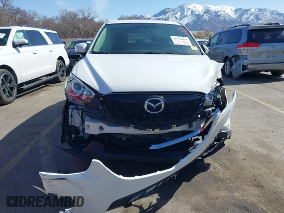 2015 Mazda CX-5 Grand Touring with VIN JM3KE4DY5F0526335, listed as a IAAI auction lot 41756046 with 1 mi miles. Bid and sale history available at carsss.com. Image 12.
