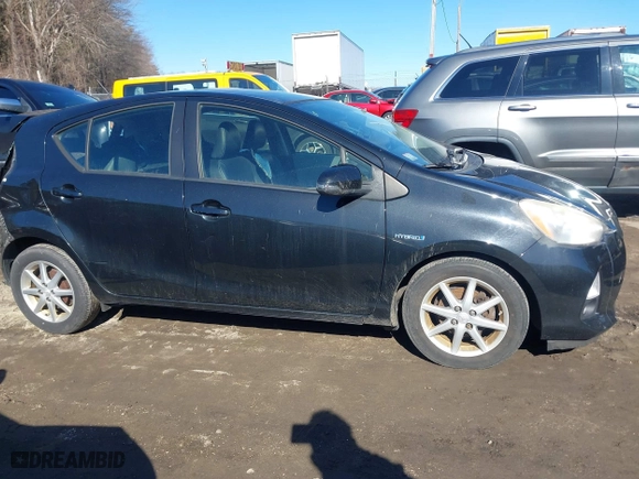2013 Toyota Prius c One with VIN JTDKDTB36D1034076, listed as a IAAI auction lot 41622385 with 148,920 mi miles. Bid and sale history available at carsss.com. Image 13.