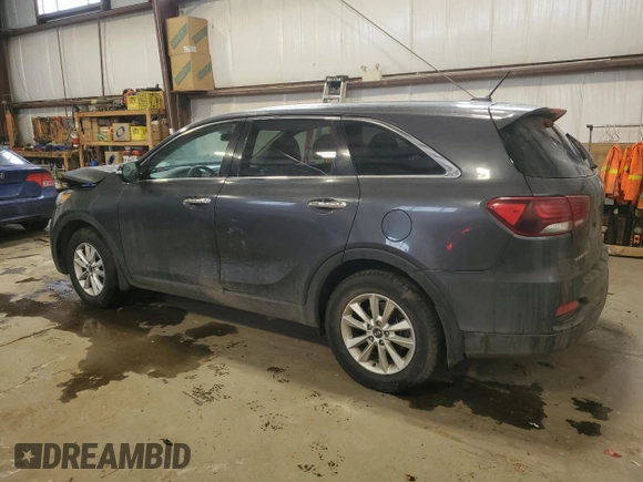 2019 Kia Sorento LX z VIN 5XYPG4A32KG548492, wystawiony jako Copart lot #61574165 z przebiegiem 134 672 mil mil oraz Szkoda całkowita • Salvage title. Historia ofert i sprzedaży dostępna na DreamBid. Obrazek 2.