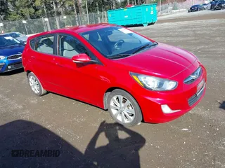2013 Hyundai Accent SE with VIN KMHCU5AEXDU076456, listed as a IAAI auction lot 41868628 with 156,113 mi miles. Bid and sale history available at carsss.com. Image 1.