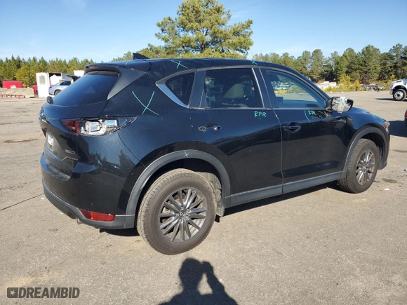 2021 Mazda CX-5 Touring with VIN JM3KFBCM7M1351884, listed as a Copart auction lot 89314565 with 32,934 mi miles and Salvage Title. Bid and sale history available at carsss.com. Image 3.