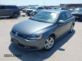 2013 Volkswagen Jetta Sedan Hybrid SE with VIN 3VW637AJ9DM228757, listed as a IAAI auction lot 41990054 with 176,365 mi miles. Bid and sale history available at carsss.com. Image 20.