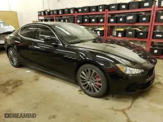 2016 Maserati Ghibli S Q4 with VIN ZAM57RTA3G1171304, listed as a Copart auction lot 69976983 with 97,099 mi miles. Bid and sale history available at carsss.com. Image 4.