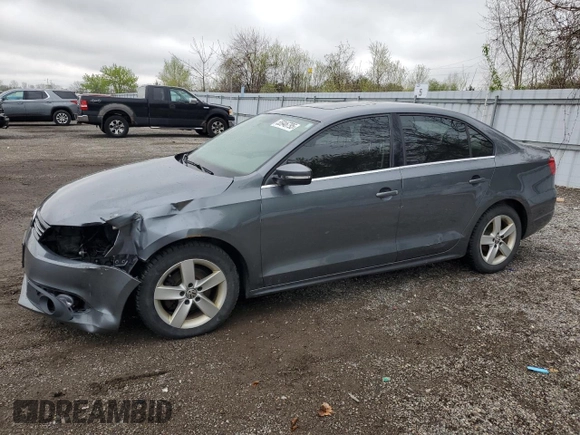 2014 Volkswagen Jetta Comfortline with VIN 3VWDL7AJ2EM399732, listed as a Copart auction lot 55946795 with 198,723 mi miles and Clean title. Bid and sale history available at DreamBid. Image 1.