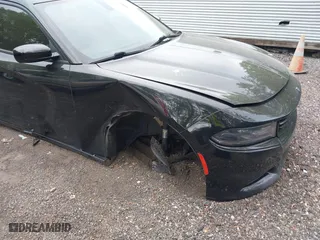 2016 Dodge Charger SXT with VIN 2C3CDXHG6GH332854, listed as a IAAI auction lot 42094761 with 114,883 mi miles. Bid and sale history available at carsss.com. Image 6.