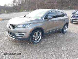 2016 Lincoln MKC Reserve with VIN 5LMCJ3D97GUJ31720, listed as a IAAI auction lot 41655116 with Not provided miles and . Bid and sale history available at DreamBid. Image 2.