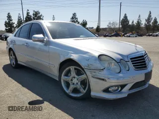 2008 Mercedes-Benz E 550 Sport with VIN WDBUF72X98B297805, listed as a Copart auction lot 61970255 with 248,178 mi miles and Salvage title. Bid and sale history available at DreamBid. Image 4.