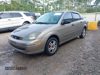 2004 Ford Focus SE with VIN 1FAFP343X4W156745, listed as a IAAI auction lot 42501461 with 289,925 mi miles and . Bid and sale history available at DreamBid. Image 2.