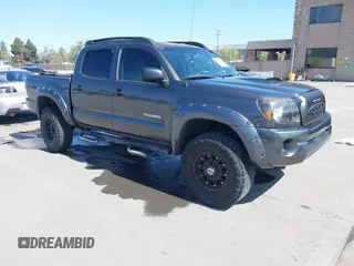 2010 Toyota Tacoma PreRunner with VIN 5TEJU4GN9AZ706709, listed as a IAAI auction lot 41968841 with 123,424 mi miles and . Bid and sale history available at DreamBid. Image 1.