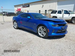 2018 Chevrolet Camaro 1LT z VIN 1G1FB1RS5J0101768, wystawiony jako IAAI lot #41990965 z przebiegiem 82 492 mil mil oraz . Historia ofert i sprzedaży dostępna na DreamBid. Obrazek 1.