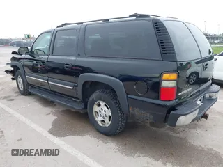 2004 Chevrolet Suburban LT z VIN 1GNFK16ZX4J291419, wystawiony jako IAAI lot #42163331 z przebiegiem 235 054 mil mil oraz . Historia ofert i sprzedaży dostępna na DreamBid. Obrazek 3.