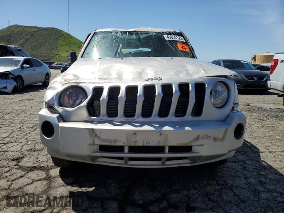 2009 Jeep Patriot Sport z VIN 1J4FT28A59D167643, wystawiony jako Copart lot #49856125 z przebiegiem 186 838 mil mil oraz Szkoda całkowita • Salvage title. Historia ofert i sprzedaży dostępna na DreamBid. Obrazek 5.