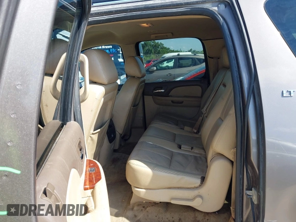 2011 Chevrolet Suburban LT with VIN 1GNSCJE03BR396610, listed as a IAAI auction lot 42348029 with 249,280 mi miles and . Bid and sale history available at DreamBid. Image 8.