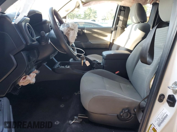 2021 Toyota Tacoma SR with VIN 3TYRX5GN8MT016665, listed as a Copart auction lot 57686725 with 53,631 mi miles and Salvage title. Bid and sale history available at DreamBid. Image 7.