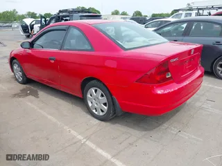 2001 Honda Civic LX with VIN 1HGEM22571L036025, listed as a IAAI auction lot 42106487 with 120,500 mi miles. Bid and sale history available at carsss.com. Image 3.