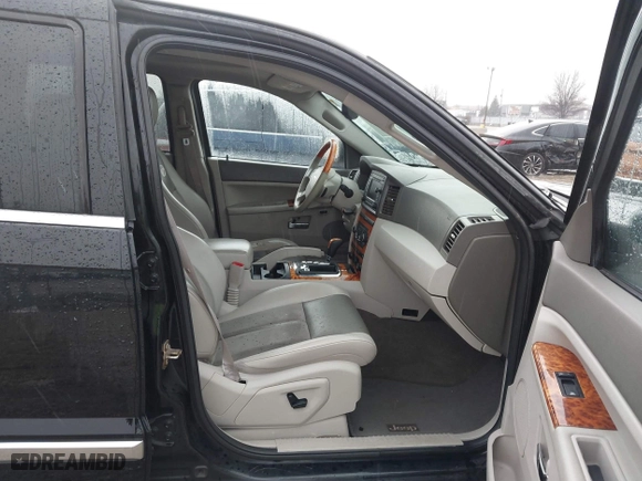 2006 Jeep Grand Cherokee Overland with VIN 1J8HR68296C308382, listed as a IAAI auction lot 41466673 with 167,028 mi miles. Bid and sale history available at carsss.com. Image 5.