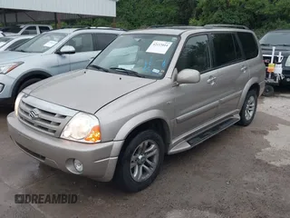 2004 Suzuki XL-7 LX with VIN JS3TX92V244114426, listed as a IAAI auction lot 42112014 with 169,377 mi miles. Bid and sale history available at carsss.com. Image 2.