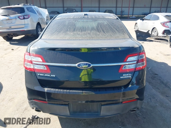 2014 Ford Taurus SEL z VIN 1FAHP2E84EG170133, wystawiony jako IAAI lot #41045369 z przebiegiem 261 732 mil mil oraz . Historia ofert i sprzedaży dostępna na DreamBid. Obrazek 17.
