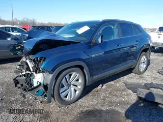 2021 Volkswagen Atlas SE with VIN 1V2JE2CA5MC206701, listed as a IAAI auction lot 41165558 with 52,631 mi miles and . Bid and sale history available at DreamBid. Image 2.