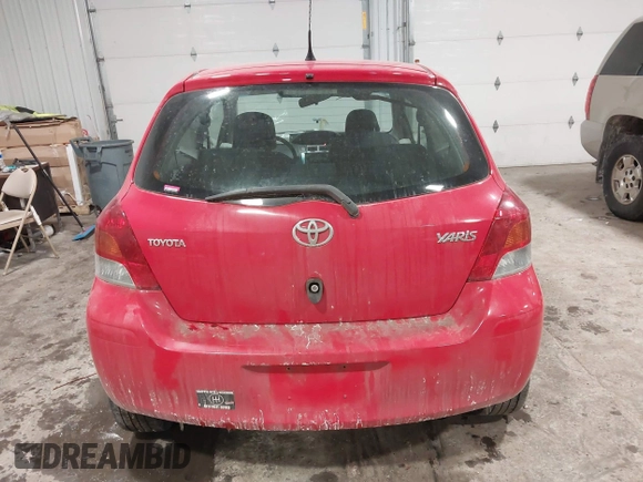 2009 Toyota Yaris with VIN JTDJT903695262292, listed as a IAAI auction lot 41636204 with 157,986 mi miles. Bid and sale history available at carsss.com. Image 16.