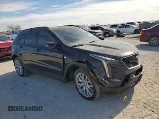 2023 Cadillac XT4 FWD Sport with VIN 1GYFZER47PF107311, listed as a Copart auction lot 87583565 with 26,585 mi miles and Salvage title. Bid and sale history available at DreamBid. Image 4.