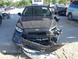 2015 Ford Fusion SE with VIN 1FA6P0H74F5120800, listed as a IAAI auction lot 42065512 with 175,875 mi miles. Bid and sale history available at carsss.com. Image 13.