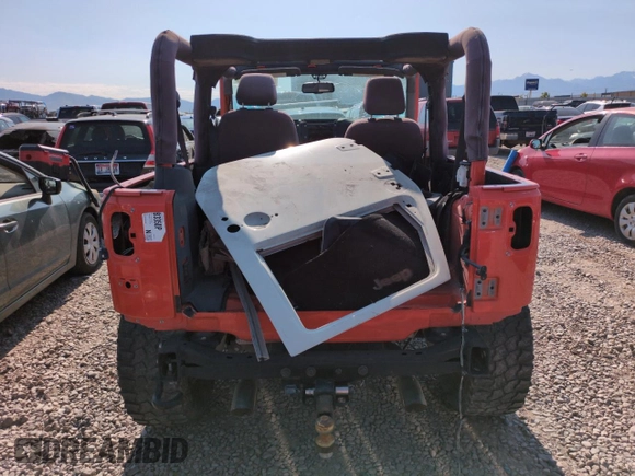 2015 Jeep Wrangler Freedom Edition with VIN 1C4AJWAG1FL613350, listed as a Copart auction lot 61978965 with Not provided miles and Salvage title. Bid and sale history available at DreamBid. Image 6.