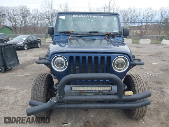 2004 Jeep Wrangler X with VIN 1J4FA39S64P780915, listed as a IAAI auction lot 42035524 with 131,057 mi miles and . Bid and sale history available at DreamBid. Image 6.