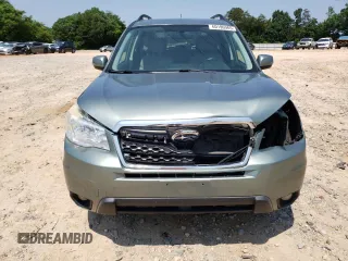 2014 Subaru Forester Touring with VIN JF2SJAMC4EH404204, listed as a Copart auction lot 60196965 with 200,292 mi miles and Salvage title. Bid and sale history available at DreamBid. Image 5.