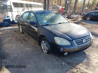2002 Nissan Altima S with VIN 1N4AL11D52C264731, listed as a IAAI auction lot 41242713 with 189,741 mi miles. Bid and sale history available at carsss.com. Image 1.