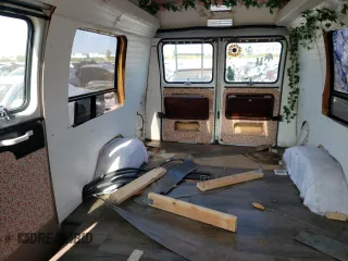 1992 Chevrolet Chevy Van z VIN 2GBEG25K3N4117707, wystawiony jako Copart lot #67318524 z przebiegiem 181 994 mil mil oraz Szkoda całkowita • Salvage title. Historia ofert i sprzedaży dostępna na DreamBid. Obrazek 10.