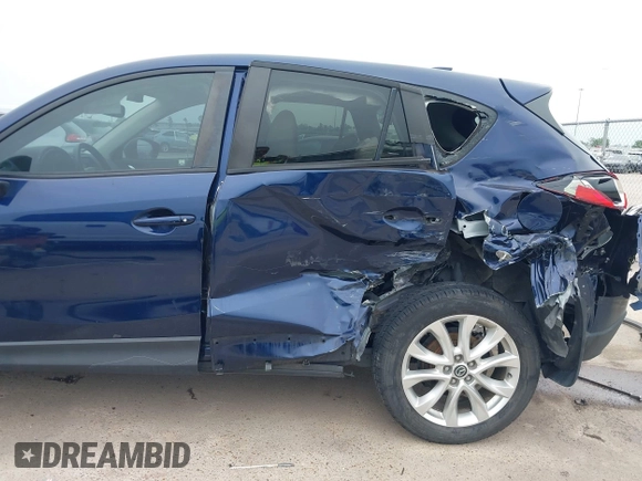 2013 Mazda CX-5 Grand Touring with VIN JM3KE2DE3D0168529, listed as a IAAI auction lot 41884766 with 173,558 mi miles. Bid and sale history available at carsss.com. Image 6.