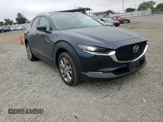 2024 Mazda CX-30 S Preferred z VIN 3MVDMBCM2RM658640, wystawiony jako Copart lot #58672425 z przebiegiem 7 977 mil mil oraz Szkoda całkowita • Salvage title. Historia ofert i sprzedaży dostępna na DreamBid. Obrazek 14.