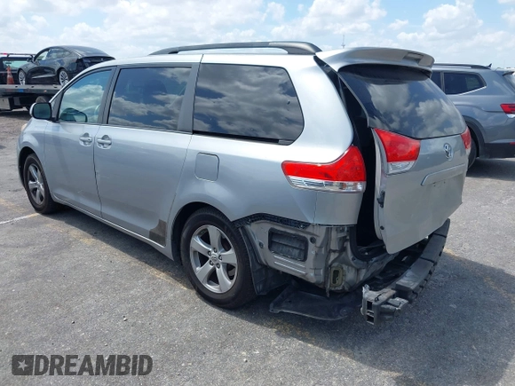 2013 Toyota Sienna LE AAS with VIN 5TDKK3DC4DS399295, listed as a IAAI auction lot 42173970 with 128,350 mi miles and . Bid and sale history available at DreamBid. Image 3.
