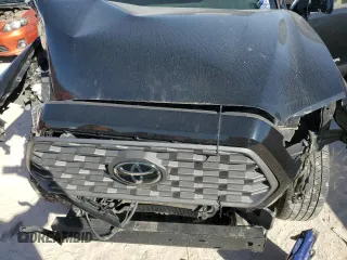 2021 Toyota Tacoma SR z VIN 3TMCZ5AN4MM396608, wystawiony jako Copart lot #46783375 z przebiegiem 70 773 mil mil oraz Szkoda całkowita • Salvage title. Historia ofert i sprzedaży dostępna na DreamBid. Obrazek 11.