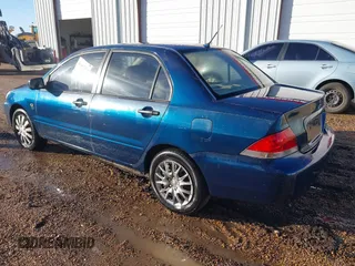 2006 Mitsubishi Lancer ES with VIN JA3AJ26E96U021297, listed as a IAAI auction lot 41462034 with 221,375 mi miles. Bid and sale history available at carsss.com. Image 3.