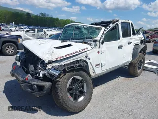 2020 Jeep Wrangler Unlimited Rubicon z VIN 1C4JJXFM5LW278740, wystawiony jako IAAI lot #42086112 z przebiegiem 93 658 mil mil oraz . Historia ofert i sprzedaży dostępna na DreamBid. Obrazek 6.