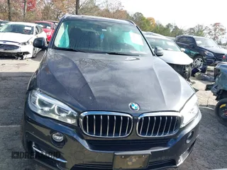 2014 BMW X5 sDrive35i with VIN 5UXKR2C56E0H32059, listed as a IAAI auction lot 41096908 with 124,322 mi miles. Bid and sale history available at carsss.com. Image 12.