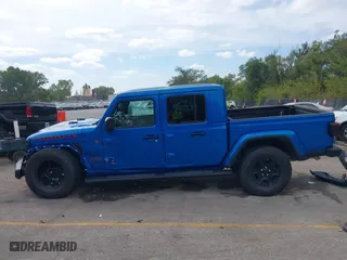 2023 Jeep Gladiator Mojave with VIN 1C6JJTEG0PL593061, listed as a IAAI auction lot 40287955 with 3,930 mi miles. Bid and sale history available at carsss.com. Image 15.