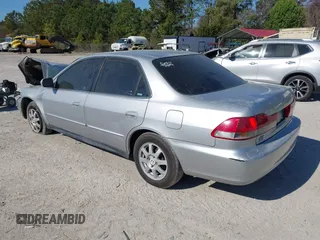 2002 Honda Accord SE z VIN 1HGCG66852A067989, wystawiony jako IAAI lot #41868854 z przebiegiem 177 905 mil mil oraz . Historia ofert i sprzedaży dostępna na DreamBid. Obrazek 3.