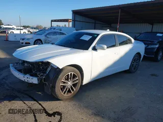 2019 Dodge Charger SXT with VIN 2C3CDXJG1KH533323, listed as a IAAI auction lot 41369282 with 102,467 mi miles and . Bid and sale history available at DreamBid. Image 2.