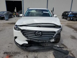 2023 Mazda CX-9 Touring z VIN JM3TCBCY6P0647537, wystawiony jako Copart lot #51578145 z przebiegiem 51 316 mil mil oraz Nie do naprawy • Non repairable. Historia ofert i sprzedaży dostępna na DreamBid. Obrazek 5.
