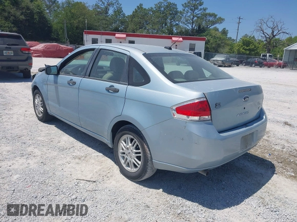 2009 Ford Focus SE with VIN 1FAHP35N19W232918, listed as a IAAI auction lot 42076066 with 165,953 mi miles. Bid and sale history available at carsss.com. Image 3.