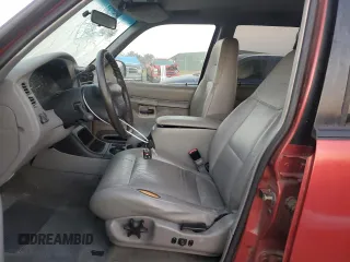 2000 Ford Explorer with VIN 1FMZU63X3YUB63135, listed as a Copart auction lot 75742324 with 168,191 mi miles and Salvage title. Bid and sale history available at DreamBid. Image 7.