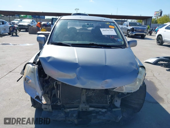 2010 Nissan Versa S with VIN 3N1BC1AP2AL394996, listed as a IAAI auction lot 40690760 with 125,972 mi miles and . Bid and sale history available at DreamBid. Image 13.
