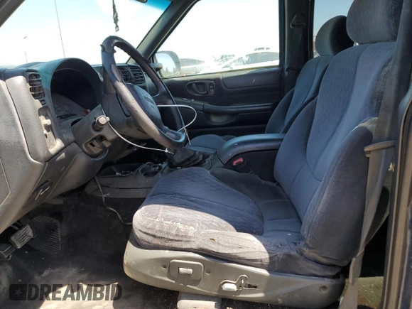 2001 GMC Jimmy SLE Rental Fleet z VIN 1GKDT13W212108144, wystawiony jako Copart lot #58753865 z przebiegiem 254 402 mil mil oraz Szkoda całkowita • Salvage title. Historia ofert i sprzedaży dostępna na DreamBid. Obrazek 7.